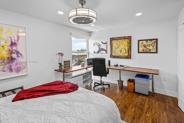 bedroom featuring dark hardwood / wood-style flooring