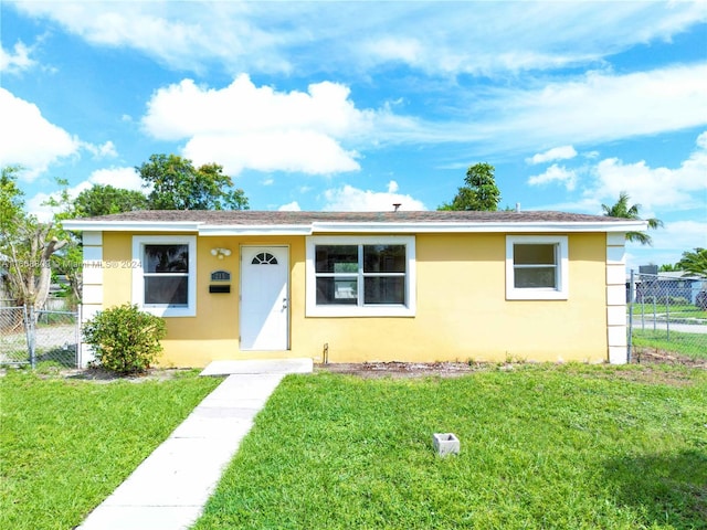 view of front of house with a front lawn