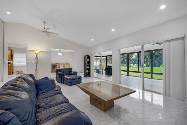 living room featuring ceiling fan and vaulted ceiling