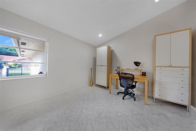 home office featuring vaulted ceiling