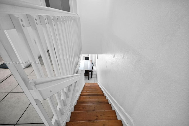 stairs with hardwood / wood-style flooring