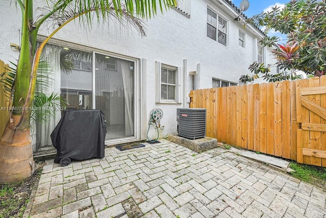 exterior space featuring a patio and central AC unit