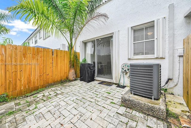 view of patio / terrace featuring cooling unit