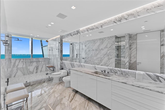 bathroom featuring tiled shower, toilet, tile walls, a bidet, and vanity