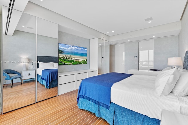 bedroom featuring light wood-type flooring