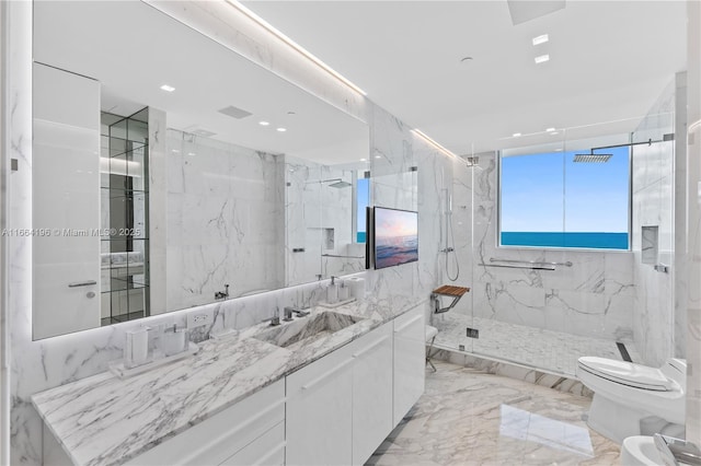 bathroom featuring vanity, marble finish floor, toilet, and a marble finish shower