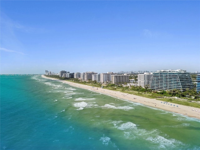 drone / aerial view with a view of the beach and a water view