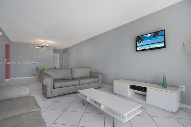 tiled living room with a textured ceiling