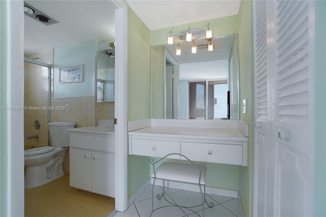 7921 Byron Ave Unit 507, Miami Beach, FL 33141 - full bath featuring toilet, tile patterned floors, vanity, and shower / bathtub combination