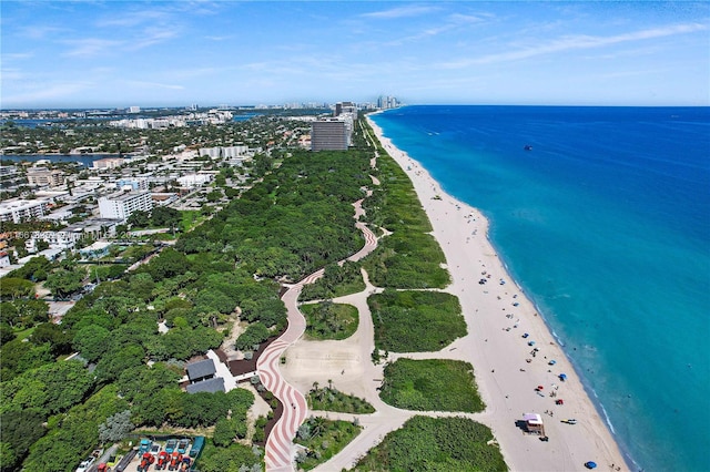 aerial view featuring a water view and a beach view