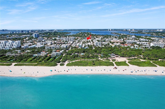 bird's eye view with a view of the beach and a water view