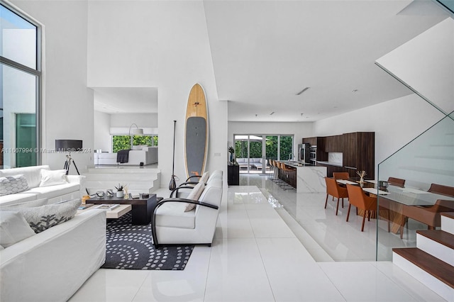 living room with light tile patterned floors