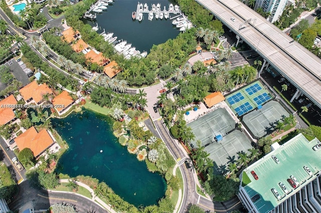 birds eye view of property with a water view