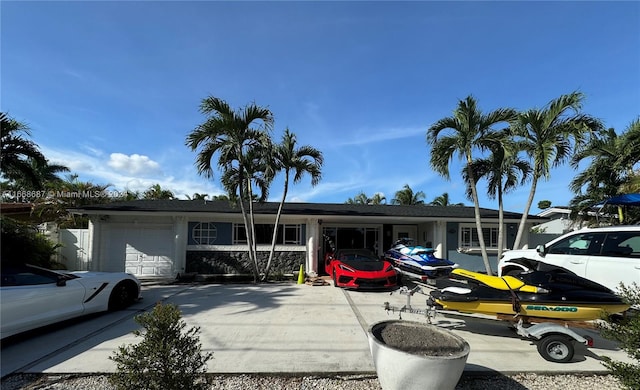 single story home with a garage