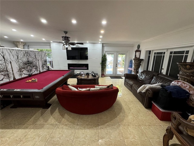 game room with a fireplace, crown molding, ceiling fan, french doors, and pool table