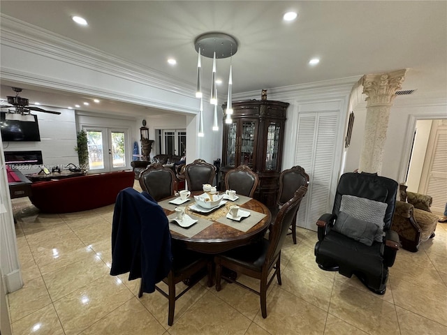 dining room featuring french doors, crown molding, and ceiling fan