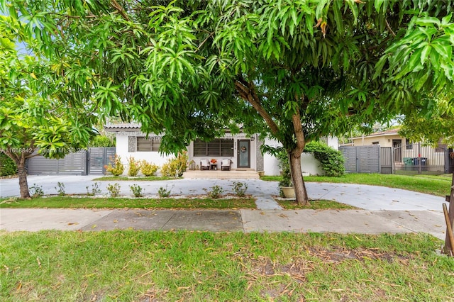 view of property hidden behind natural elements