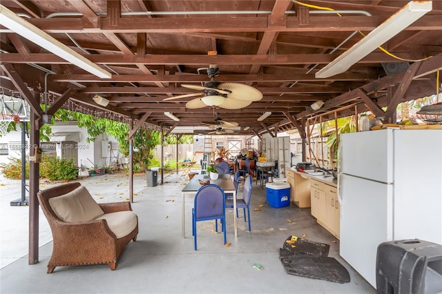 view of patio / terrace featuring ceiling fan