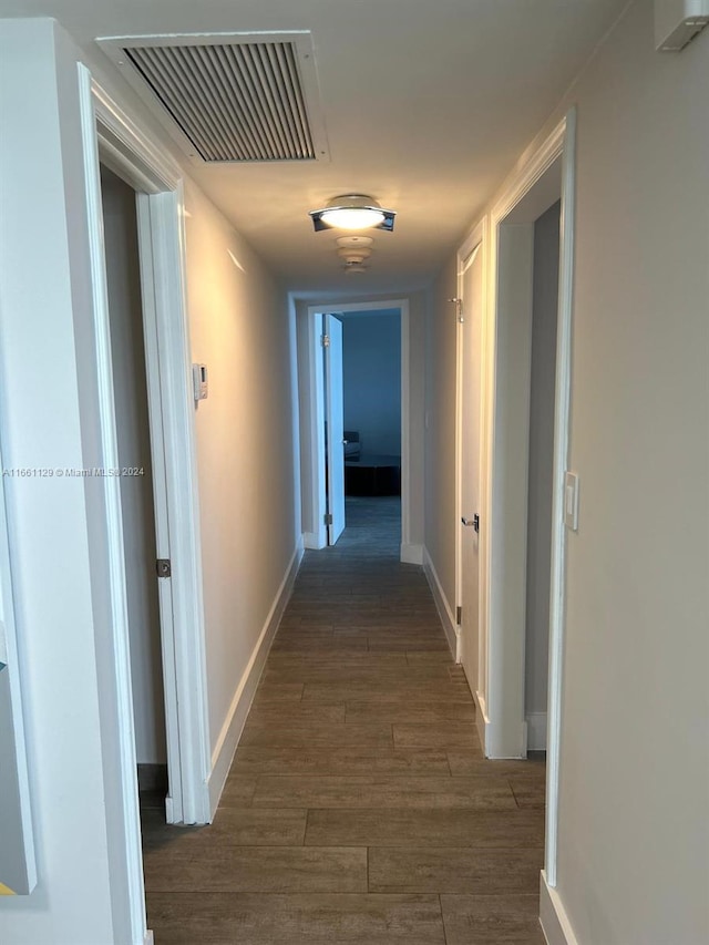 hall featuring dark hardwood / wood-style floors