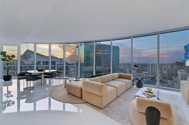 living area with expansive windows and a city view