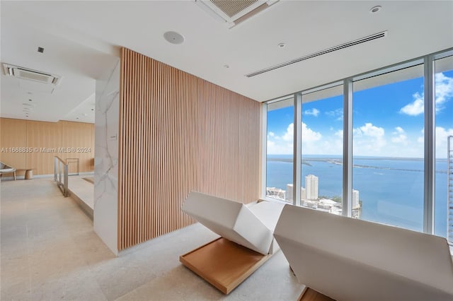 living area with a water view