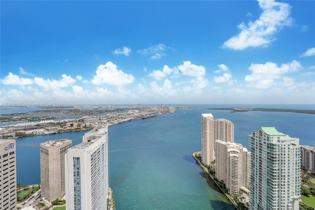 view of urban area featuring a large body of water
