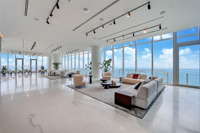 lobby with a wall of windows and a water view