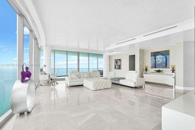 living room with floor to ceiling windows