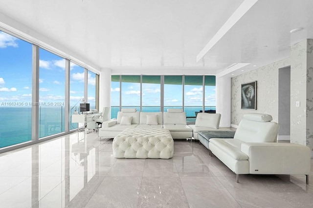 living room with a water view and expansive windows