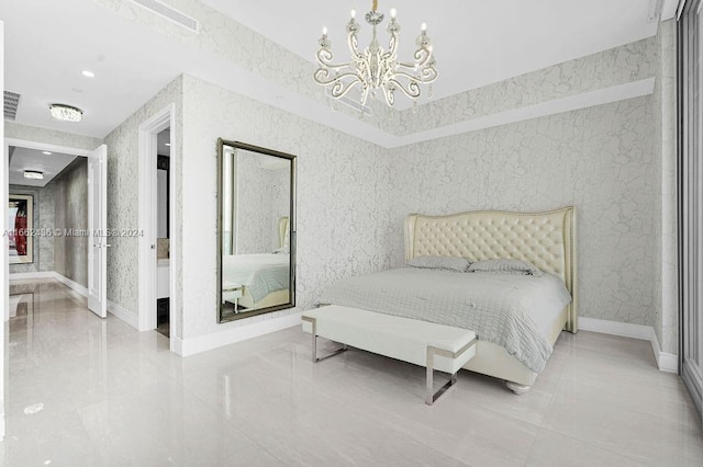 bedroom featuring ensuite bathroom, a notable chandelier, and tile patterned flooring