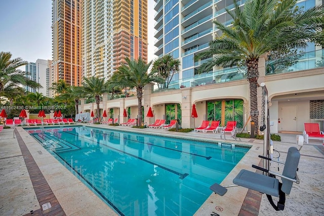 view of pool featuring a patio