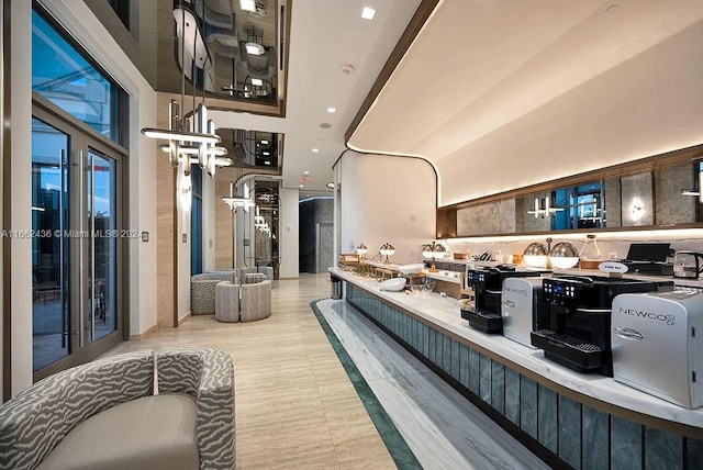 interior space featuring a high ceiling and dark brown cabinetry