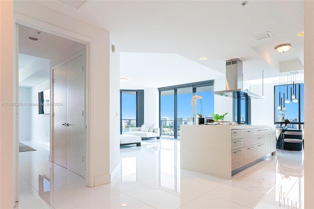 corridor featuring light tile patterned flooring