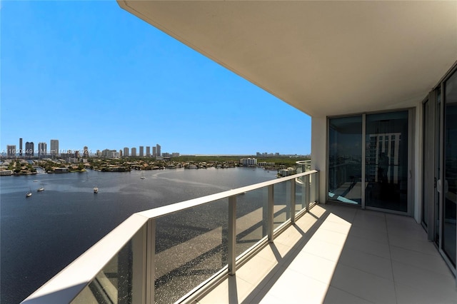 balcony featuring a water view