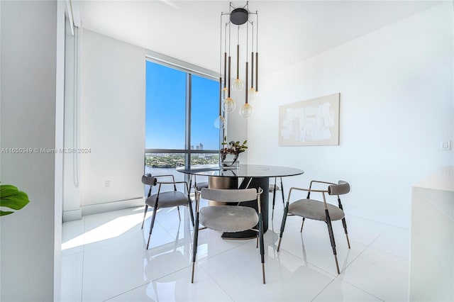 tiled dining area with expansive windows