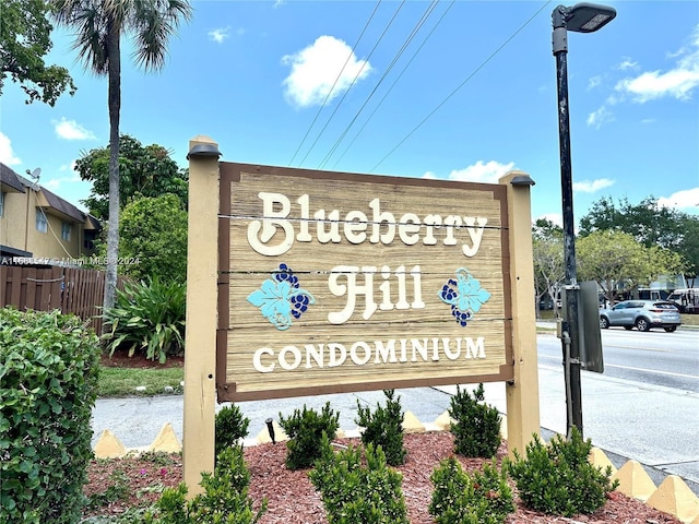 view of community sign