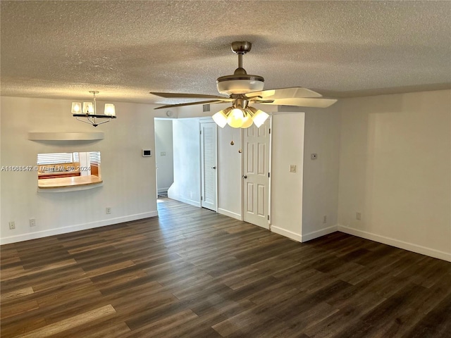 unfurnished room with ceiling fan, a textured ceiling, and dark wood-type flooring