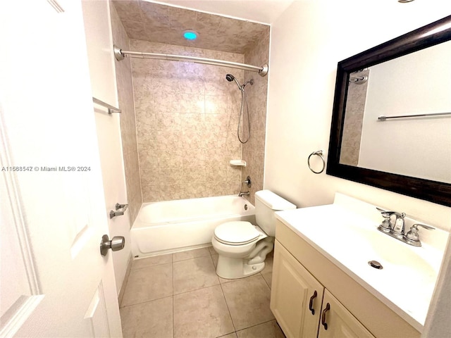 full bathroom featuring vanity, tiled shower / bath combo, toilet, and tile patterned floors