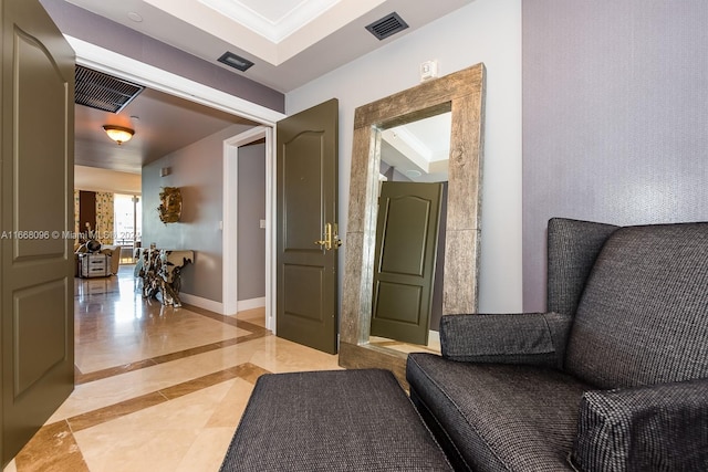 interior space with crown molding and tile patterned floors