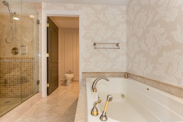 bathroom with tile patterned flooring, separate shower and tub, and a bidet