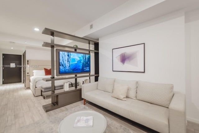 living room with light hardwood / wood-style floors