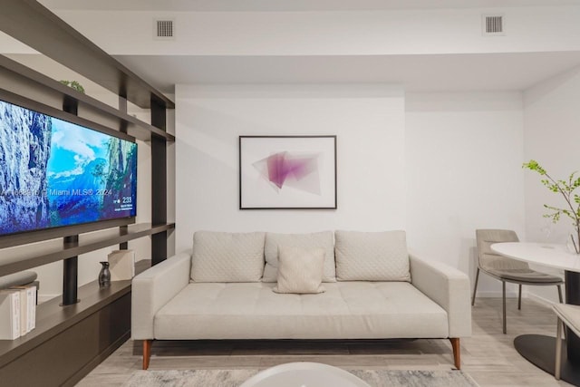 living room with wood-type flooring