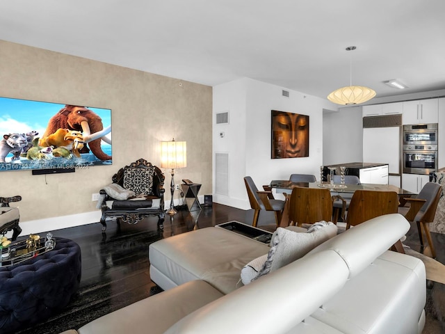 living room featuring dark hardwood / wood-style floors