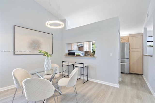 dining space featuring light hardwood / wood-style flooring