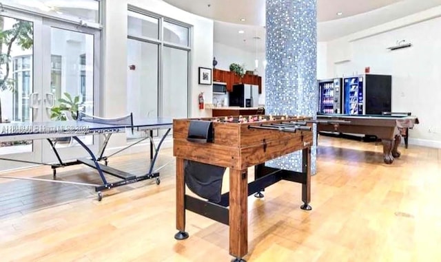 game room featuring ornate columns, wood-type flooring, and pool table