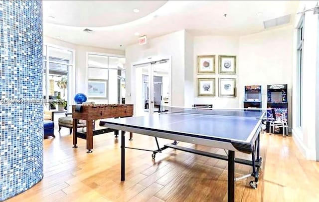 game room featuring hardwood / wood-style floors