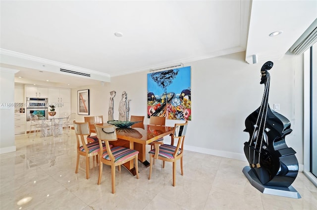 dining space featuring crown molding, recessed lighting, and baseboards