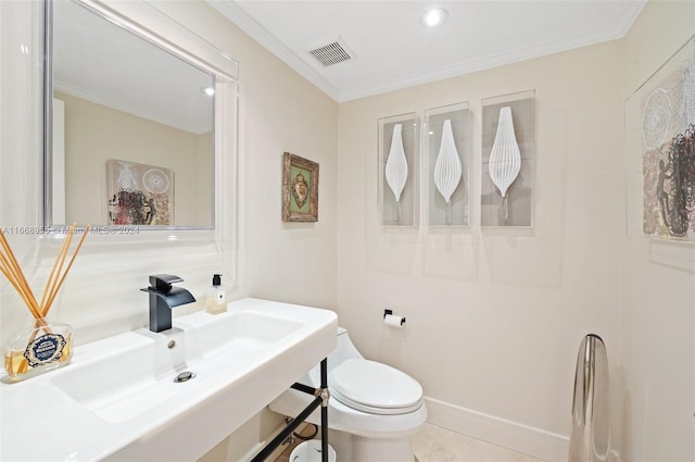 half bathroom with a sink, toilet, recessed lighting, visible vents, and ornamental molding