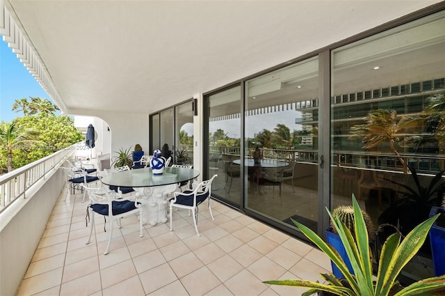 balcony with outdoor dining area