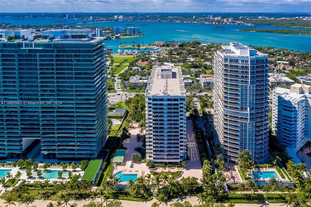 aerial view featuring a view of city and a water view